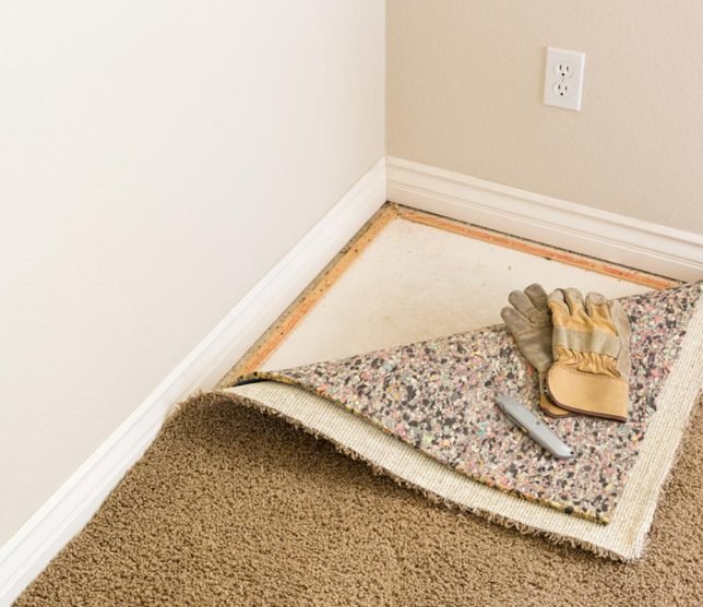 homeguide-carpet-removal-tack-padding-carpet-pulled-back homeguide-carpet-removal-tack-padding-carpet-pulled-back